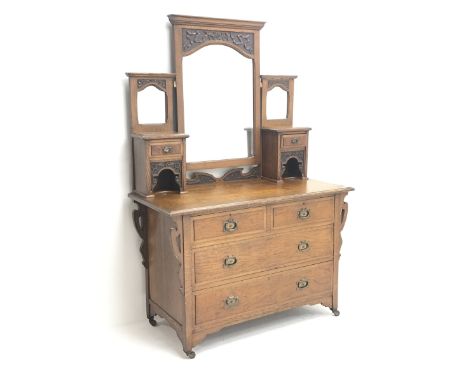 Early 20th century oak dressing chest, fitted with two short and two long drawers with Art Nouveau copper handles, mirror bac