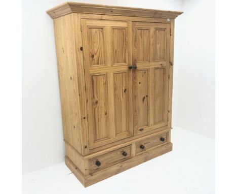  Light oak display cabinet, projecting cornice, two doors enclosing glazed shelves above two drawers, stile supports, W88cm, 