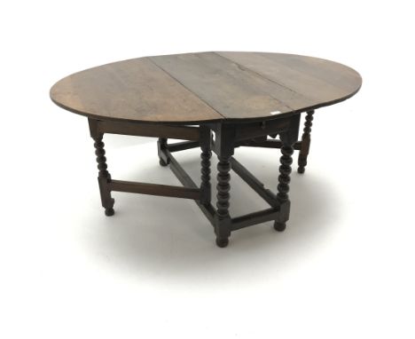 18th century oval oak drop leaf table, bobbin supports, gate leg action, W162cm72cm, D119cm - Condition Report 