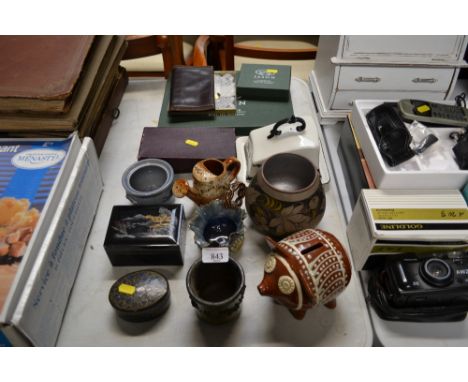 A Doulton Lambeth jug; lacquered trinket box; Slip ware decorated money box; place mats; chess pieces etc