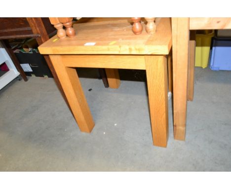 A light oak occasional table