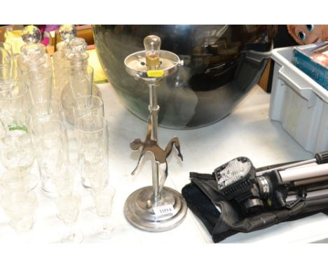 An Art Deco chrome table lamp decorated with female figure