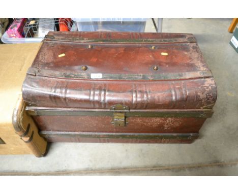 A metal travelling trunk