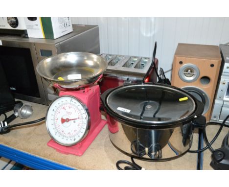 A Morphy Richards slow cooker, set of kitchen scales and a four slice toaster