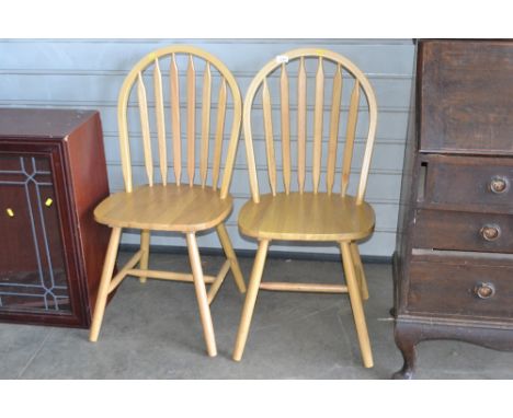 Two stick back chairs