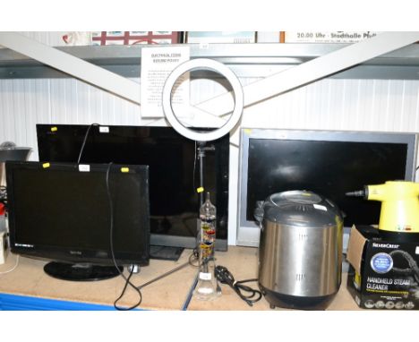 A glass thermometer and a ring light