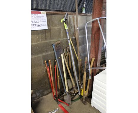 A large quantity of long handled garden tools