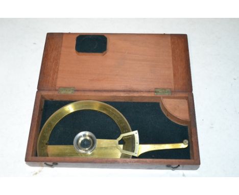 A mahogany cased brass instrument by V Neck &amp; Co. Buckingham Gate London