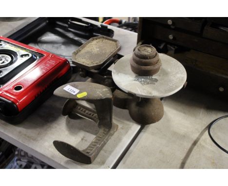 A shoe last and a set of scales and weights