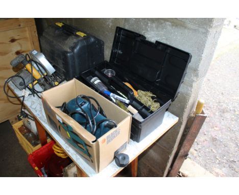 A tool box and contents and a Black &amp; Decker wallpaper steamer