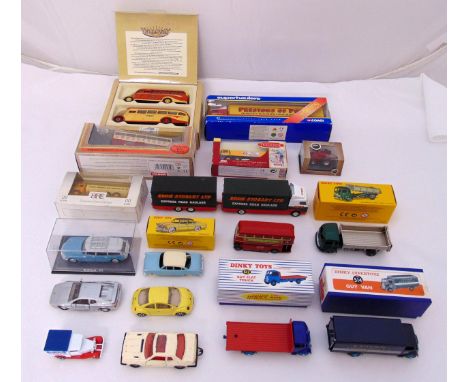 A quantity of diecast cars, trucks and buses to include Corgi, Dinky, Lledo and EFE, some in original packaging