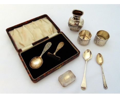 A quantity of hallmarked silver and white metal to include a cased pusher and spoon, an engine turned pill box, two salts, tw