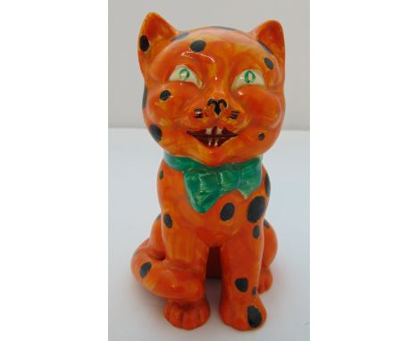 Clarice Cliff Bizarre orange Laughing Cat with black spots pottery figurine circa 1930, 15.5cm (h) marks to the base