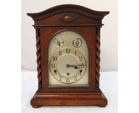A mahogany cased bracket clock silvered dial, Arabic numerals, three train movement to include key and pendulum, 40 x 31 x 19