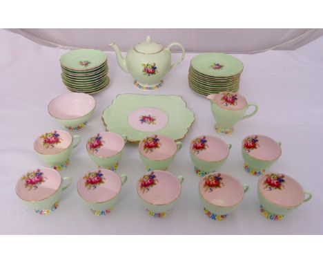 A mid 20th century Foley China teaset to include a teapot, milk jug, sugar bowl, cake plates, plates, saucers and cups, marks