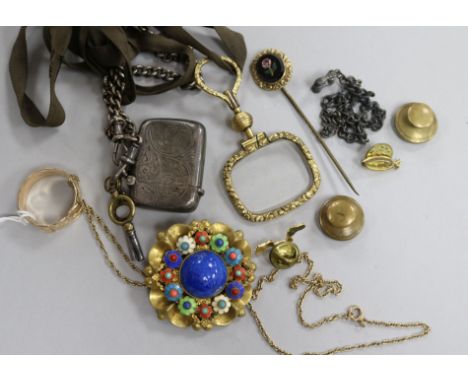 A 9ct gold buckle ring, a 9ct gold chain and other items including a silver vesta case.