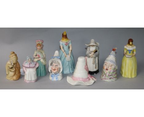A collection of nine Royal Worcester candle extinguishers