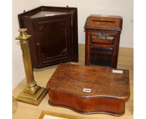 Two oak letter boxes, a corner cabinet and a brass table lamp