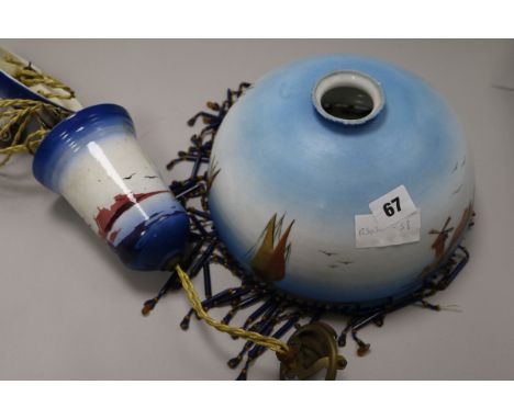 An early 20th century French painted glass and ceramic hanging lamp