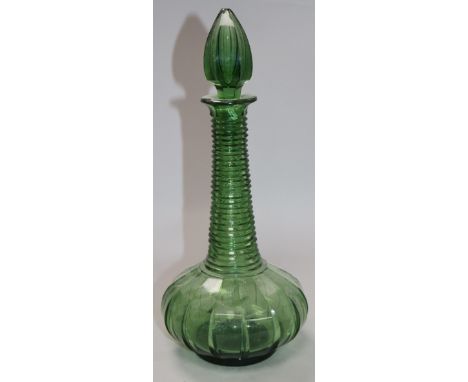 An early Victorian green glass spire decanter 32cm