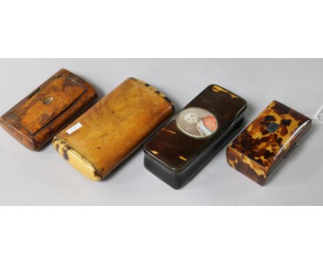 An early 19th century horn and tortoiseshell snuff box inset with a miniature and a tortoiseshell casket and two burr wood sn