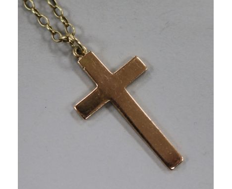 A 9ct gold cross pendant on 9ct gold chain, pendant 40mm.