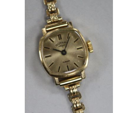 A lady's 9ct gold Rotary manual wind wrist watch, on a 9ct gold bracelet.
