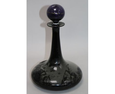 A Victorian amethyst glass ship's decanter 28cm