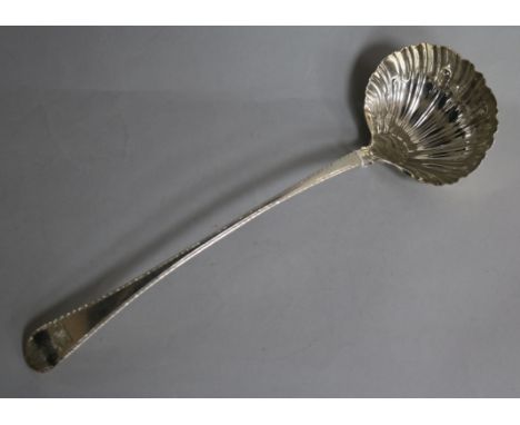 A George III silver feather edge Old English pattern soup ladle, Thomas Edwards?, London, 1769, 34.5cm, 5.7 oz.