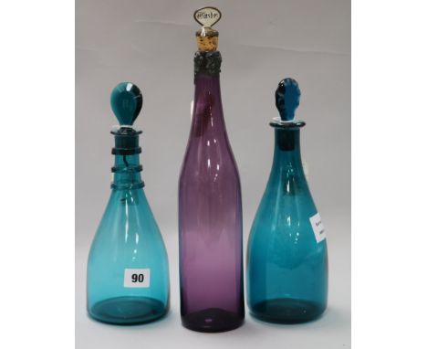 Two Georgian green glass decanters and a later amethyst glass decanter