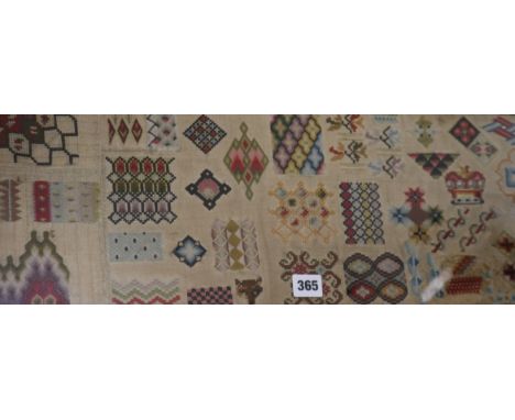 A late 19th century needlework sampler, depicting different patterns, 22 x 92cm