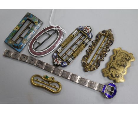 Six assorted buckles including one Edwardian silver and enamel and a white metal and enamel bracelet.