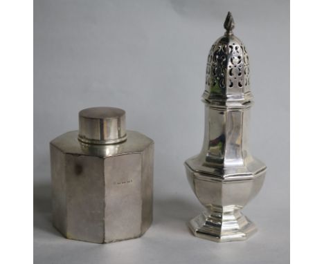 A silver tea caddy and a silver sugar caster.
