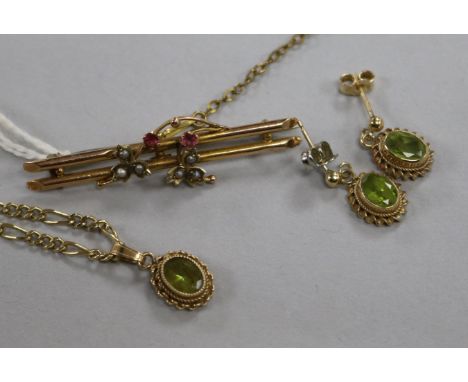 A 9ct gold gem set pendant on chain and matching earrings and a 9ct gold bar brooch.