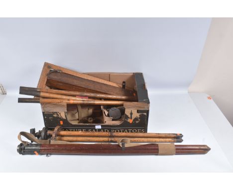 A COLLECTION OF VINTAGE MEASURING EQUIPMENT, to include a theodolite, compass, and other items, most of this equipment looks 