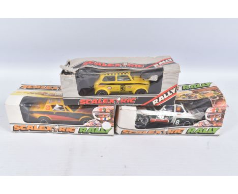THREE BOXED SCALEXTRIC RALLY CARS, Triumph TR7, No.C114, B.M.W. 320 Turbo, No.C116 and Mini 1275GT Rally Special, No.C122, al