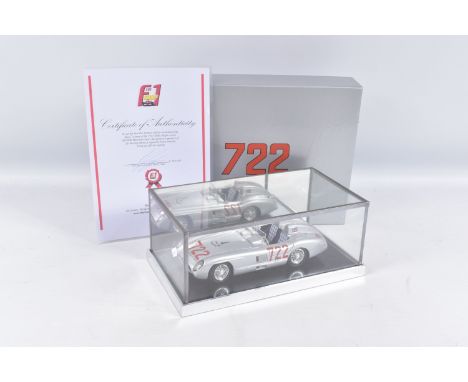 A DISPLAYED BBURAGO MERCEDES BENZ 1955 300SLR 722 1:18 SCALE MODEL VEHICLE SIGNED BY STIRLING MOSS, silver body with tartan s