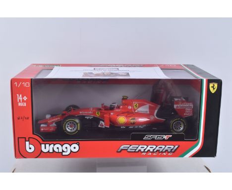 A BOXED BBURAGO FERRARI RACING SF15 T 1:18 SCALE FORMULA 1 MODEL SIGNED BY K. RÄIKKÖNEN, numbered 18 16801R 11543, red body w