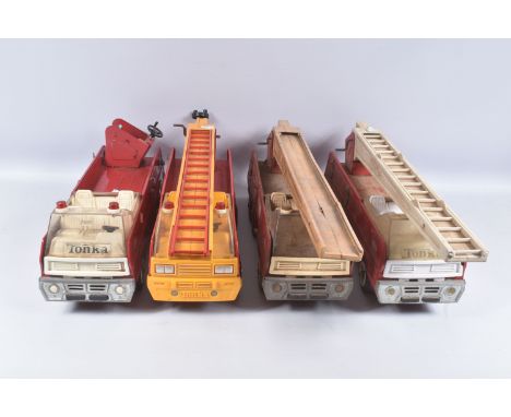 FOUR TONKA TOYS AERIAL LADDER FIRE TRUCKS, two with extension ladders, one extends ok, other not working, two with ladders th
