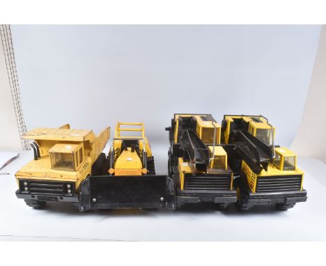 FOUR ITEMS OF MIGHTY TONKA TOYS CONSTRUCTION EQUIPMENT, a Bulldozer, 2 x Lorry/Truck mounted Grab Cranes, one appears complet