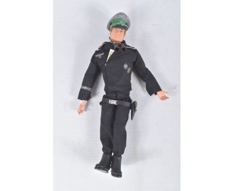 A PALITOY ACTION MAN FIGURE WEARING A GERMAN PANZER CAPTAIN UNIFORM, 1970's blonde flock hair figure, uniform appears complet