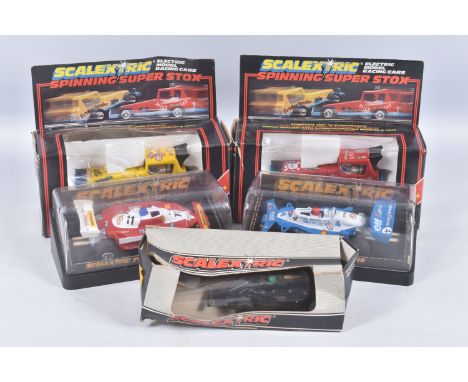 THREE BOXED SCALEXTRIC FORMULA 1 RACING CARS, Wolf WR5, No.C133, Ely Tyrrell 008, No.C135 and Ferrari 312 T3, No.C136, with t