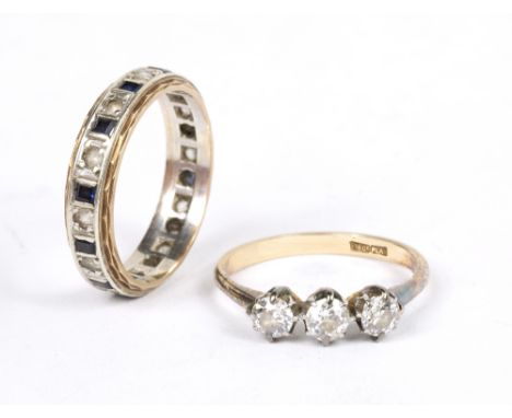 18ct yellow gold three stone diamond ring size P, and a yellow and white metal white and blue stone full hoop eternity ring, 