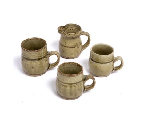 Attributed to Richard Batterham (b.1936) a pair of mugs, one other mug and a small jug, unmarked (4)
