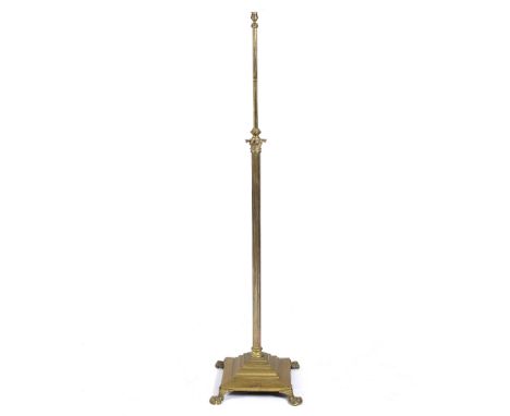 Brass extending standard lamp on a stepped base, approximately 163cm high
