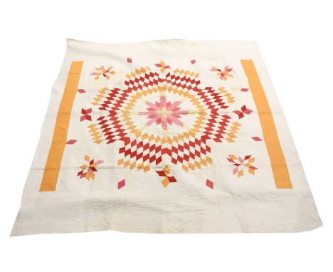 Late 19th Century North Country Star of Bethlehem or Lone Star Cotton Quilt, central pink star radiating out into colours of 