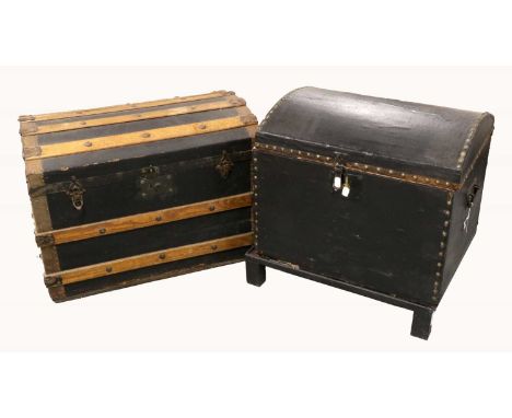 An Early 20th Century Domed Black Leatherette Mounted Hinged Trunk, on a black painted stand, studded decoration, carrying ha