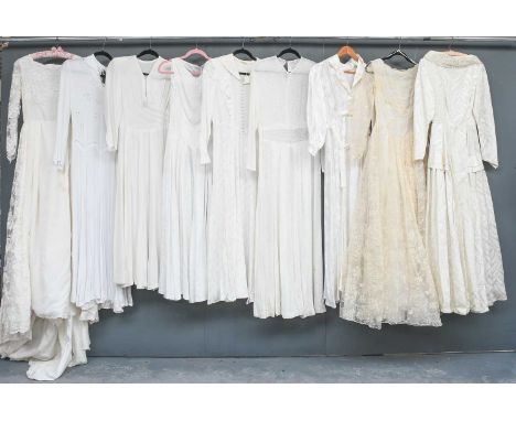 Circa 1930-60s Wedding Dresses, comprising a cream crepe long sleeve dress with V-neck and pleated detail to the bustivory te