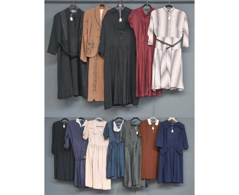 Circa 1940s and 1950s Day Dresses, comprising a black, grey and green striped metallic dress with pockets, vent pleat and a m