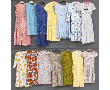 Circa 1950s and Later Ladies Day Dresses, comprising a floral motif sleeveless dress in white, green, yellow, red and light g